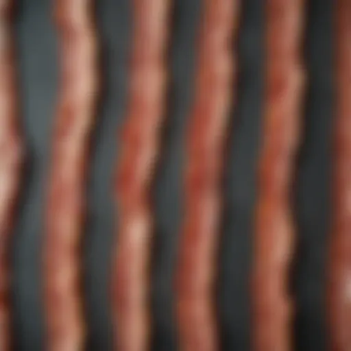 Perfectly cooked bacon strips arranged on a plate