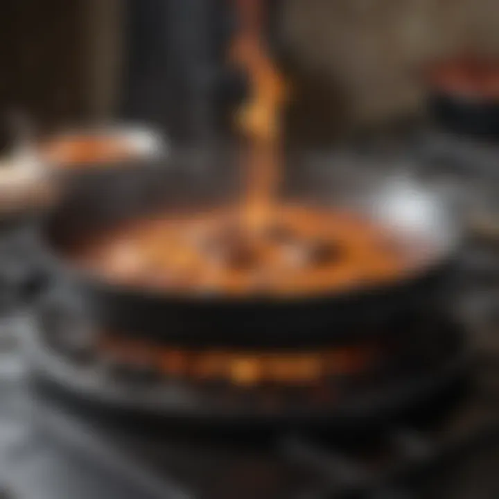 Close-up of a brazier pan on a stove, highlighting its even heat distribution.