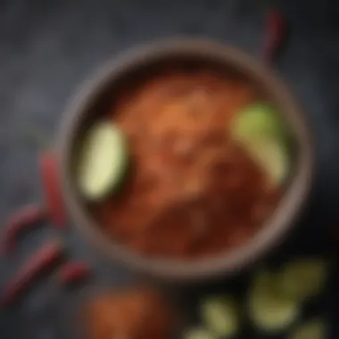 A close-up view of homemade chilli lime seasoning in a decorative bowl.