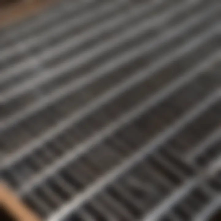 A close-up view of stainless steel grill grates after cleaning.