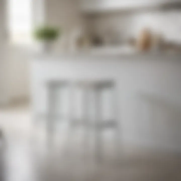 Modern metal counter stools that enhance a white kitchen decor