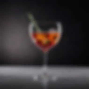 A close-up of an elegant cocktail glass filled with a signature drink.