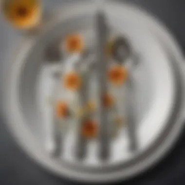 Close-up of stainless steel flatware with a floral design