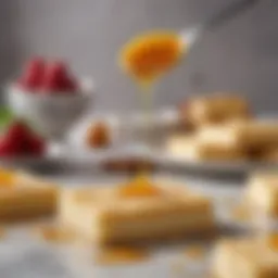 A close-up of golden shortbread syrup drizzled over a dessert