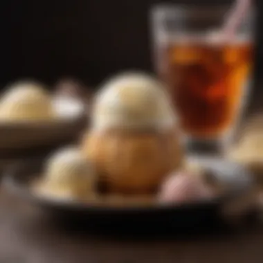 A sophisticated glass of bourbon beside a scoop of ice cream