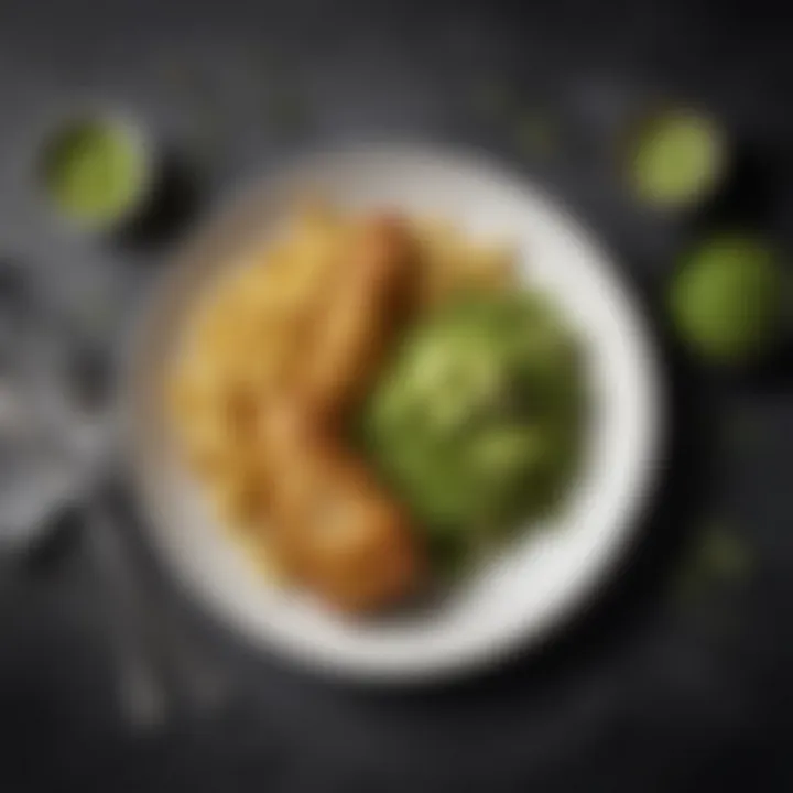 A stylish plate featuring mushy peas alongside traditional fish and chips