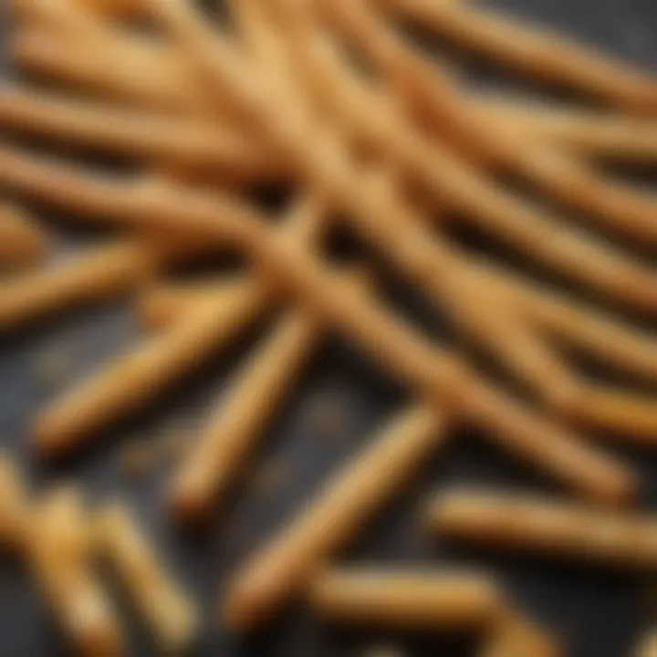 A close-up view of cheese straws showcasing their flaky texture and cheese infusion