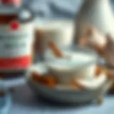 A close-up view of coquito ingredients including coconut milk, cinnamon, and rum