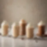 A variety of non-dairy coffee creamers in elegant glass containers