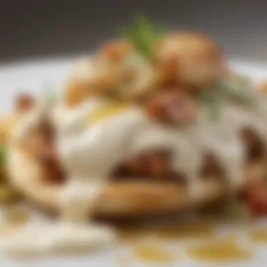 A close-up of creamy garlic sauce drizzled over gyros