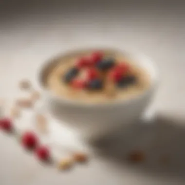 Elegant Oatmeal Bowl An elegant bowl of oatmeal embellished with nuts, berries, and honey against a minimalist background