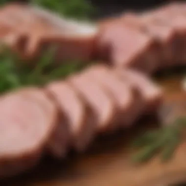 Various pork cuts arranged artistically with herbs and spices