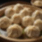 A close-up view of perfectly steamed soup dumplings showcasing their delicate skins.