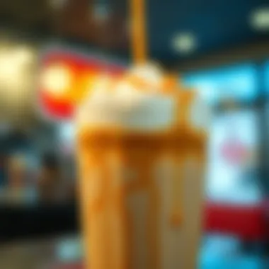 Close-up of a caramel iced latte with a drizzle of caramel sauce on top