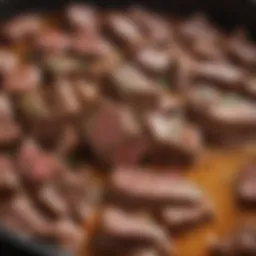 Close-up of tender beef tips simmering in rich gravy