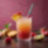 Vibrant sweet tart cocktail garnished with fresh fruits