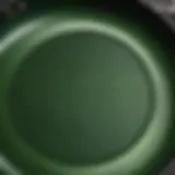 Close-up of a green coated frying pan showcasing its unique texture