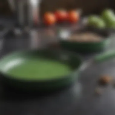 Comparison of a green coated frying pan against traditional metal pans