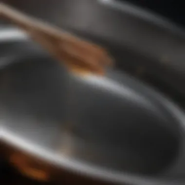 Close-up of a wok lid reflecting light, emphasizing its craftsmanship.