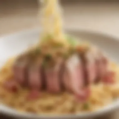 A close-up of a fork twirling noodles with tuna and mayo, highlighting texture.