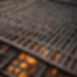 Close-up view of barbecue grates showing residue buildup