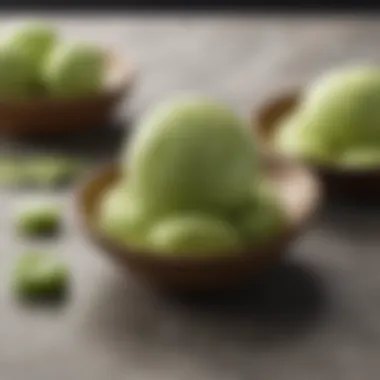 A vibrant green matcha ice cream served with a side of mochi.