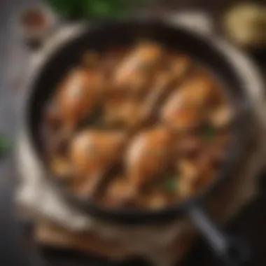 A skillet showcasing the sautéing of chicken in Marsala wine sauce