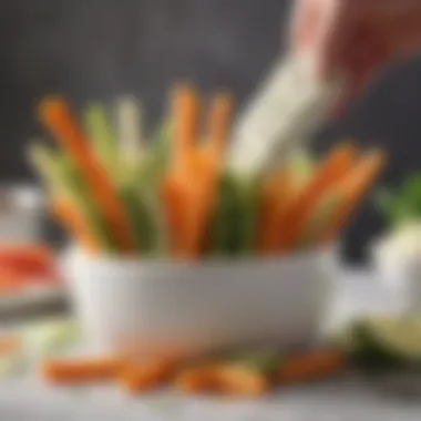 Colorful vegetable sticks served with a creamy dip