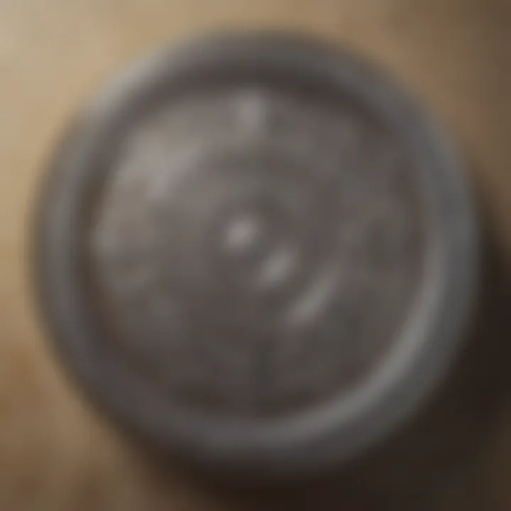 Close-up of an ornate vintage glass jar lid