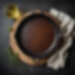 A gleaming cast iron skillet with a rich, seasoned surface