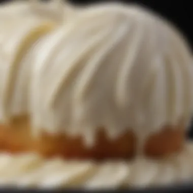 A close-up of the smooth texture of cream cheese frosting