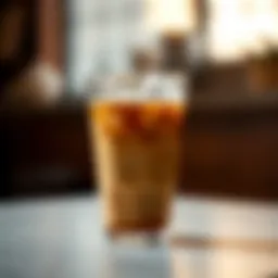 Chilled coffee cup with ice cubes