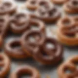 A close-up of chocolate-covered pretzels glistening under soft light