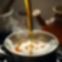 Golden syrup bubbling in a saucepan