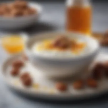 A close-up view of a bowl of Greek yogurt topped with honey and nuts, a popular Mediterranean breakfast choice.